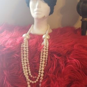 Triple strand pearl necklace